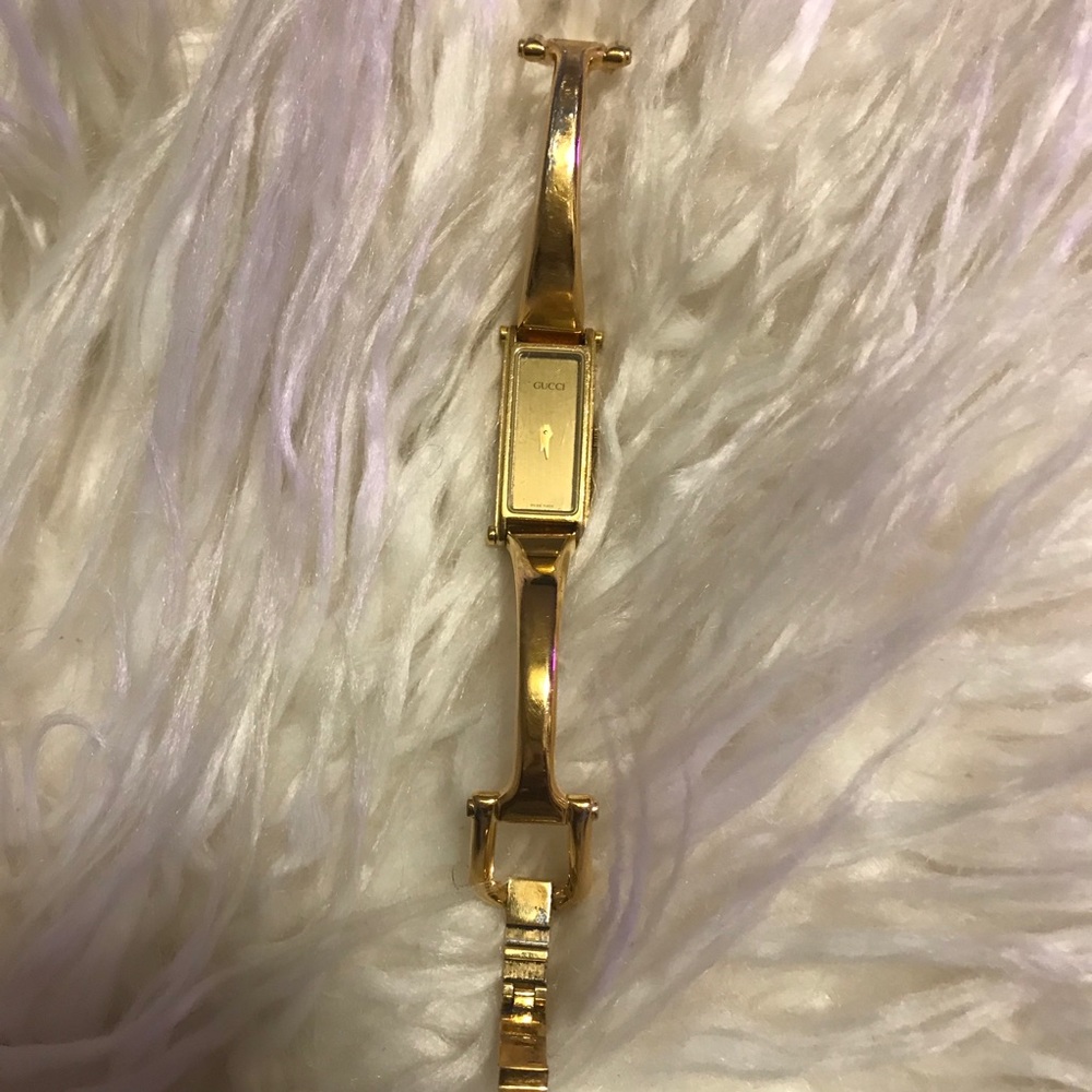 Gucci gold watch